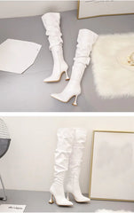 أحذية طويلة فوق الركبة