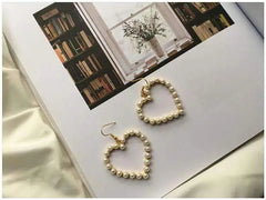 أقراط على شكل قلب هندسي عتيق