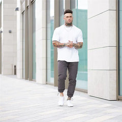 تي شيرت رجالي رياضي من القطن بقصّة Slim Fit للتمرينات الرياضية