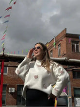 سترة مطرزة بقلب أحمر