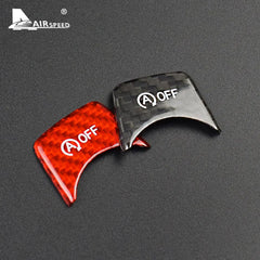 زر تشغيل وإيقاف محرك السيارة من ألياف الكربون