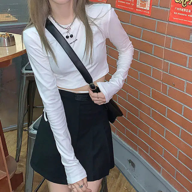 قمصان طويلة الأكمام للنساء بتصميم مثير للمحاصيل