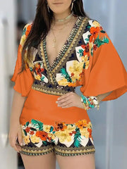 رومبر مزين بالزهور وفتحة رقبة على شكل حرف V