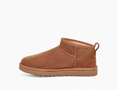 حذاء شتوي قصير من جلد الأغنام على شكل حذاء ثلجي