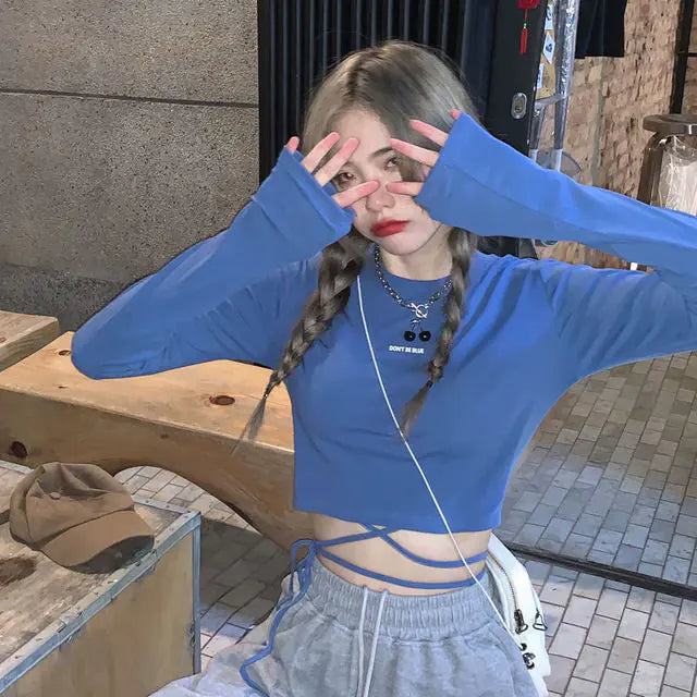 قمصان طويلة الأكمام للنساء بتصميم مثير للمحاصيل